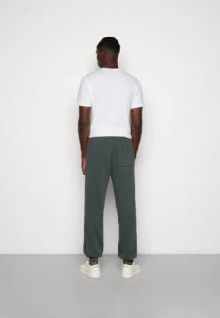 YOURTURN Oversized Unisex - Trainingsbroek -Dark Green -Aanbiedingen Yourturn Winkel 42776076c49c4d49984fa3254d41719b